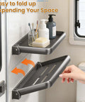 Super Sleek Aluminum RV Folding Wall Shelf With Hidden Drop Down Design in use, showing toiletries on two-tiered mounted storage.