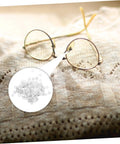 Silver rimless eyeglass frame on knit fabric with inset showing 200 Piece Rimless Eyeglass Frame Repair Washers For Quick Repairs