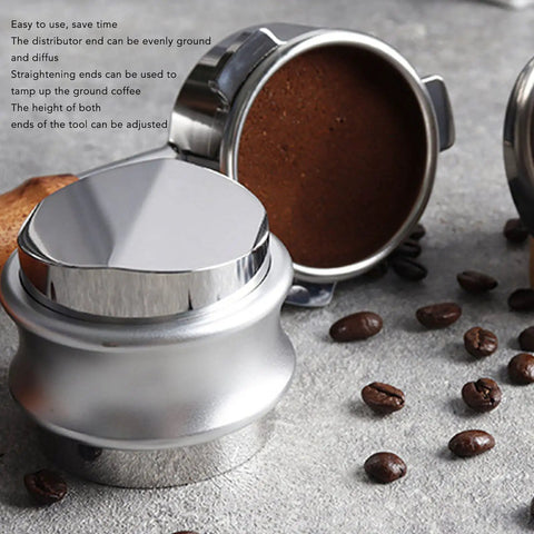Dual Head Espresso Coffee Distributor And Adjustable Tamper With Bamboo Base Smoothly Fluffs And Levels Grounds For Dead Nuts Consistent Pulls In 51MM Portafilter Baskets on a gray surface with coffee beans.