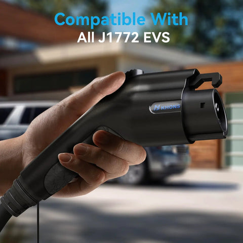 Hand holding J1772 Compatible Level 2 EV Wall Charger For 240V 40A With 25Ft Cable And NEMA 14 50 Plug, vehicle in background