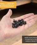 Top Shelf Heavy Duty M6 Rack Screws And Cage Nuts Kit With Flat Washers Shop Grade black coated fasteners held in hand.