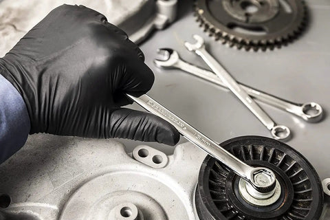 Mechanic using 28 Piece Combination Wrench Set With 6 Point Box Ends, SAE And Metric, 15 Degree Offset For Tight Spaces, Off Corner Loading