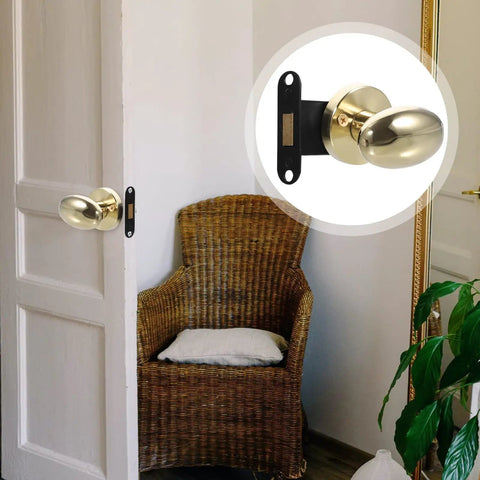 Sleek Concealed Door Handle Featuring Smooth As Butter Swing Dead Nuts Secure Integrated Deadbolt Lock Brushed Stainless Steel Finish For Bedroom Use Zero Drama Install Heavy Duty Performance Quiet Close Hardware Modern Minimalist Style on a door with a woven chair in background.