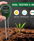 Hand holding Three In One Soil Tester With Moisture, Light And PH Meter For Gardening And Lawn Care, testing soil next to seedling.