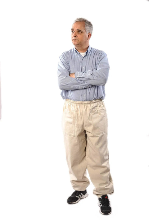 Man wearing beekeeping pants for full lower body protection from bees and wasps, heavy duty workwear with reinforced knees.
