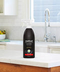Daily Granite Cleaner Refill Apple Orchard Scent For Granite Marble And Sealed Stone 68 Fl Oz on kitchen counter