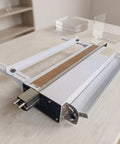 Heavy Duty Acrylic Bending Machine 110V Thermal Sheet Bender on workspace, showing heating strips and design for acrylic projects.