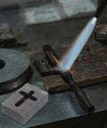 Graphite Cross Shaped Casting Mold for Melting Trusted by Jewelers High Precision Graphite Tool on metalwork table with torch