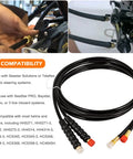 Close-up of 16 ft marine hydraulic hose kit compatible with Seastar and Teleflex systems, featuring black hoses with brass ends.