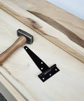 8 Pack Black T Shape Gate Hinges With Screws Zinc Plated T Strap Hinges on wood with hammer, heavy duty outdoor use.