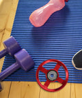 Two Pack Aluminum Gym Pulley Wheels Replacement For Home Gym Systems with dumbbells and yoga mat