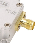 Close-up of SMA female connector on wideband LNA amplifier 10MHz to 6GHz with 30dB gain and low noise for radio gear, DC 5V.