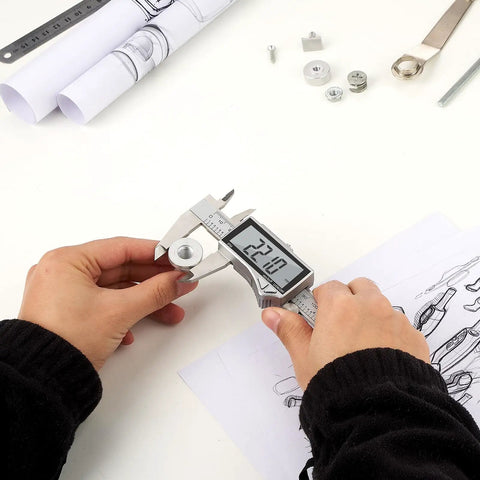 Person measuring part with Handy Digital Caliper Measuring Tool Stainless Steel With Large LCD Screen, 0 To 6 Inch Precision Caliper