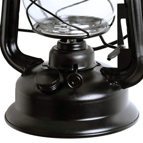 Close-up of plug in wall sconce lamp with E27 base metal glass shade, black finish. Cozy soft light for living room bedside and hotel home decor.