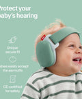 Baby wearing green Baby Ear Muffs For Hearing Protection With 24 Decibels Noise Reduction, Adjustable Headband, CE and ANSI Certified
