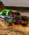 Unlimited Desert Racer Kit With Velineon VXL 6S ESC, 2000Kv Brushless Motor, realistic tube chassis, on a dirt terrain