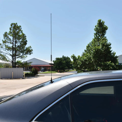 Pretuned Dual-Band Ham Radio Antenna Kit 144 148 MHz VHF And 440 450 MHz UHF installed on car roof in outdoor setting