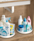 Lazy Susan Turntable Organizer 10 Inch 360 Degree Rotating Tray in cabinet holding cleaning supplies