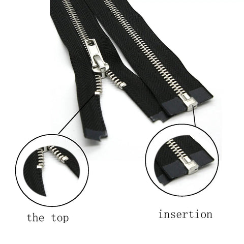 Close-up of 160 Piece Metal Zipper Insertion Pins Kit For DIY Zipper Repair showing insertion detail with slider and top pins.