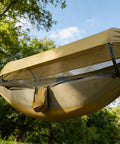 3 In 1 Camping Hammock Tent With Mosquito Net And Rainfly set up outdoors in a forest, showing durable fabric and netting