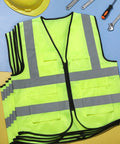 Straight Up Heavy Duty Reflective Safety Vests Bulk 100 Pack With Zipper And Utility Pockets Fluorescent Green high-visibility vests laid flat.