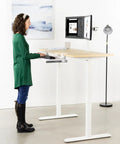 Large Under Desk Keyboard And Mouse Tray With Smooth Slider Rail System, Heavy Duty Quick Grip Clamp For Ergonomic Typing Comfort in use at standing desk.