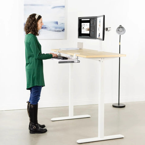 Large Under Desk Keyboard And Mouse Tray With Smooth Slider Rail System, Heavy Duty Quick Grip Clamp For Ergonomic Typing Comfort in use at standing desk.
