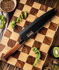 Kiritsuke Knife Cover With Walnut Magnetic Sheath For 10 Inch Blades on cutting board with green peppers and kiwi