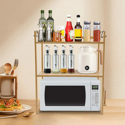 Top Shelf Heavy Duty Double Tier Microwave Stand With Cutting Board Holder And Four Utensil Hooks For Countertop Storage Kitchen Organization No Sweat Setup with kitchen condiments and microwave.