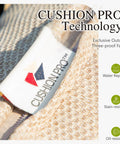 Close-up of Cushion Pro tag on All Weather Outdoor Patio Furniture Set With High Back Wicker Sofa for durability details.