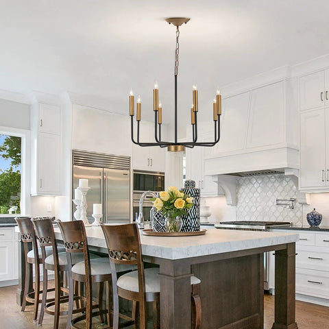 Industrial Eight Light Farmhouse Chandelier With Rustic Iron Candle Pendants above kitchen island with white cabinetry