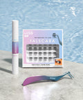 All Day Lash Bond And Seal With Biotin And Vitamin E For Falscara Lashes displayed beside lash extensions and applicator