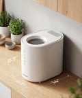 OK-255 Electric Kitchen Composter Turns Food Scraps Into Fertilizer, 5.5L Large Countertop Bin on wooden kitchen counter