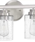 Bolden 4 Light Vanity Light Fixture In Brushed Polished Nickel With Clear Seeded Glass Shades installation view on white background