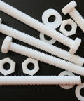 Top Shelf Natural PTFE Hex Head Bolts M10 X 100mm Screw Set Drops Right Into Place With Nuts And Washers on dark background.