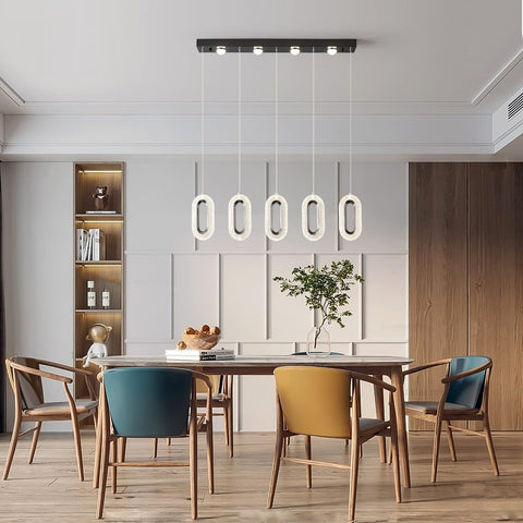 60W Dimmable LED Pendant Chandelier With Remote Control, 5-Light Slick Modern Black Fixture above a modern dining table