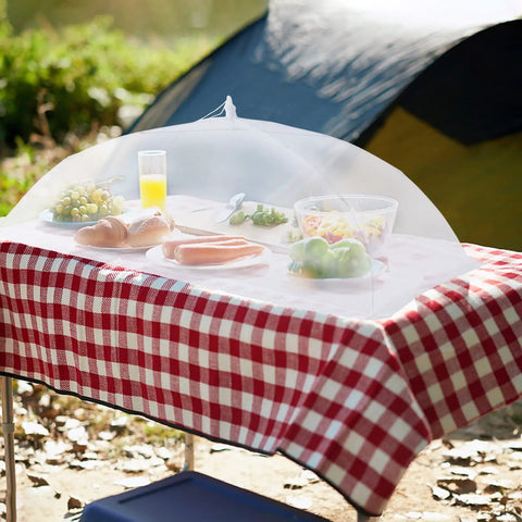 7 Pack Outdoor Mesh Food Covers Set With One Extra Large 40 By 24 Inch And Six Standard 17 Inch Covers over picnic table