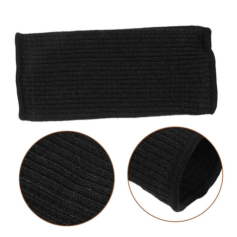 Heavy Duty Cut Resistant Arm Guards And Thorn Proof Work Sleeves Delivering Badass Coverage For Mechanics Welders Gardeners Handling Outdoor Tasks And Weekend Project Grind, black fabric close-up.