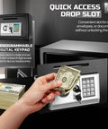 Person using drop slot of Drop Slot Money Safe Box With Digital Keypad Lock for Home Office or Cabinet Security, showing keypad and cash entry.