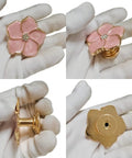 Legit Gorgeous Gold Floral Cabinet Knobs With Sparkling Rhinestone Center 5 Petal Pearlescent Enamel Dresser Pulls in hand view.