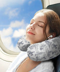 Woman relaxing on plane with Women's Memory Foam U Shaped Neck Pillow For Travel And Daily Use On The Go in Cactus White