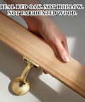 Premium Grade Six Foot Red Oak Handrail Kit with Rock Solid Brass 90 Degree Arms, close-up of hand holding oak rail.