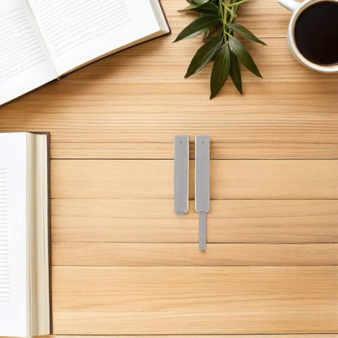 4 Pack Invisible Push Latch Kit For Wardrobe And Cabinet Doors on wooden table with books and coffee