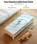 2K Indoor Security Camera System Dual Pack With 360 Degree Pan Tilt AI Tracking on coffee table with dog sleeping nearby