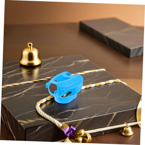 5 Piece Hollow Out Pigeon Injection Holder With Buckle Stable Fixation Feeder Rack on marble surface with gold bells