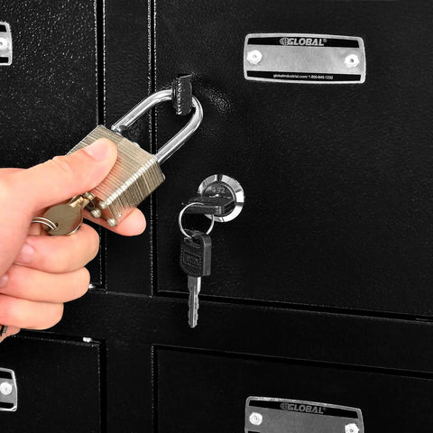 Real Tough Twenty Four Door Cell Phone And Tablet Locker Cabinet with individual key compartments, showing padlock and key in use.