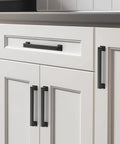 Matte Black Cabinet Pulls 5 Inch 128mm Hole Centers Zinc Alloy Drawer Handles for Kitchen Cabinets installed on white cupboards