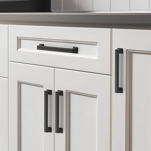 Matte Black Cabinet Pulls 5 Inch 128mm Hole Centers Zinc Alloy Drawer Handles for Kitchen Cabinets installed on white cupboards