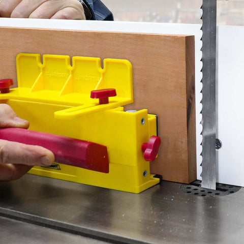 Front view of yellow Milescraft GrabberPRO push block with red knobs for table saw use.
