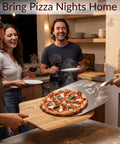 People enjoying pizza served on a Pizza Peel 12 By 14 Aluminum Paddle With 21 Inch Detachable Wooden Handle in a kitchen setting.